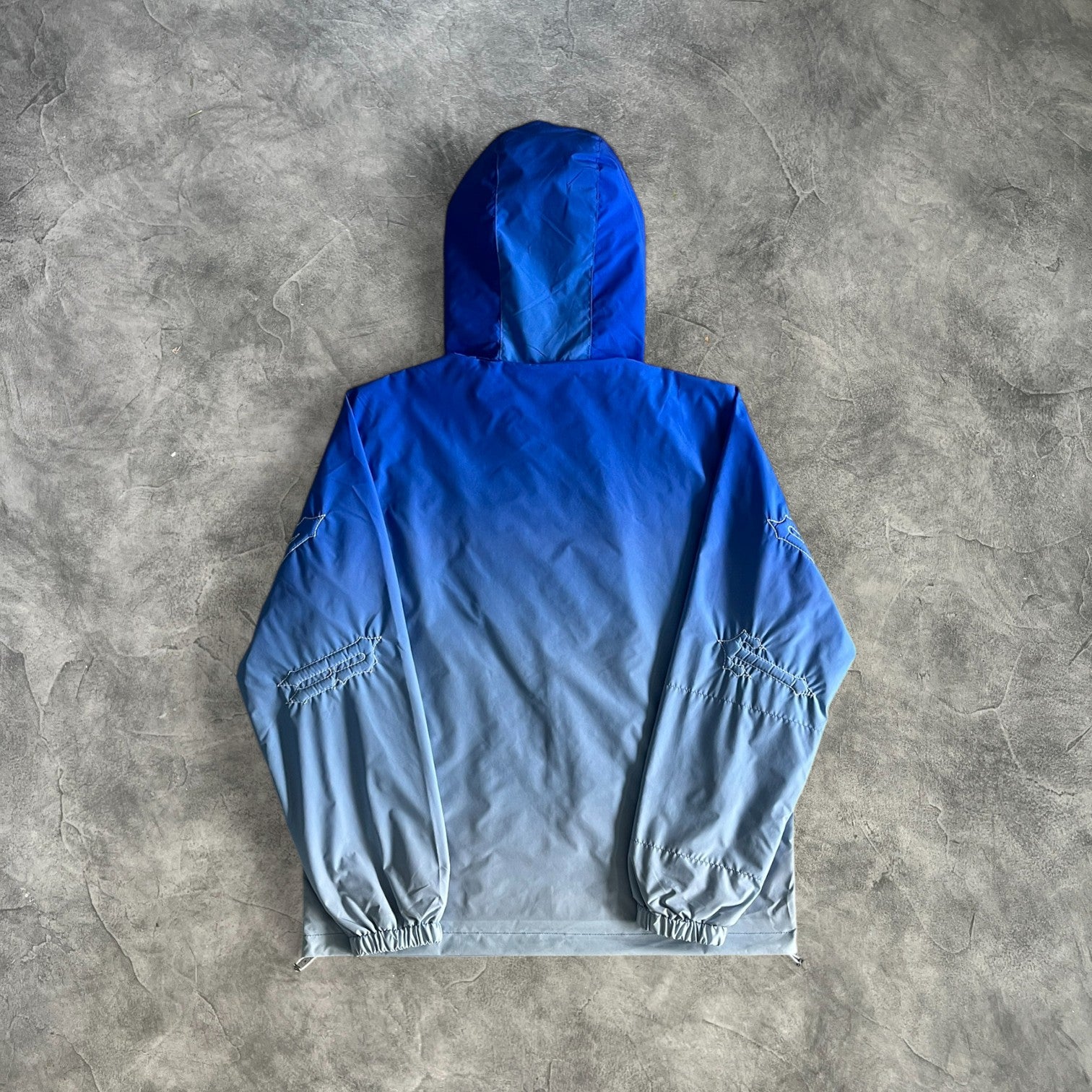 Trapstar Outline Arch Windbreaker Gradient Sky Blue